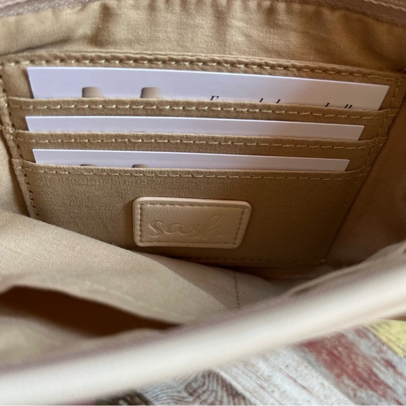 The Sash Bag Cream Crossbody NWT Multi-Pockets Zip Pockets CC Slots Adjustable - Picture 6 of 8